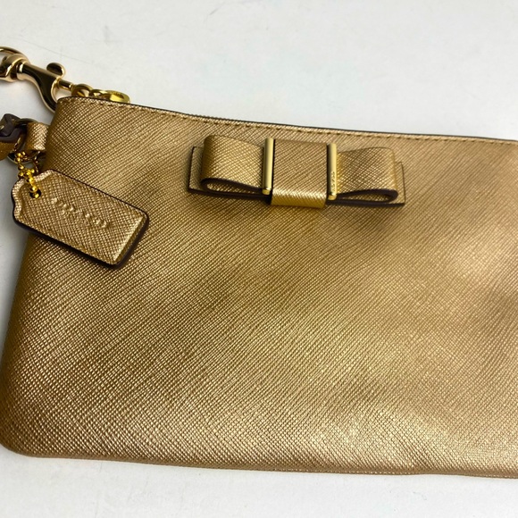 Coach Golden Bow Darcy Wristlet - Picture 2 of 7